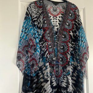 Beautiful designer inspired swim suit cover up